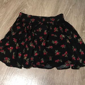 Brandy Melville black floral skirt.